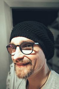 Close-up portrait of man wearing hat