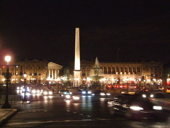 Cars moving on street at night