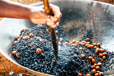 Close-up of person preparing food