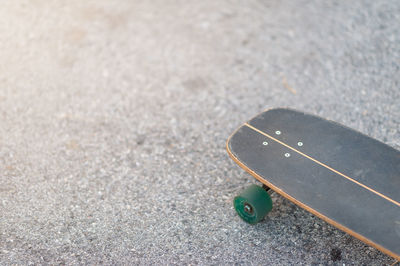 High angle view of skateboard on road