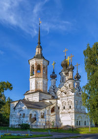 Low angle view of building against blue sky