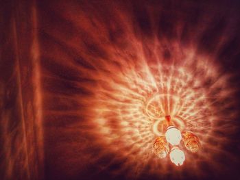 Low angle view of illuminated lights