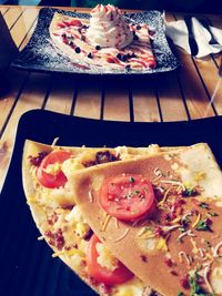 High angle view of pizza served in plate