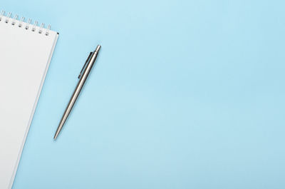 High angle view of pen against blue sky