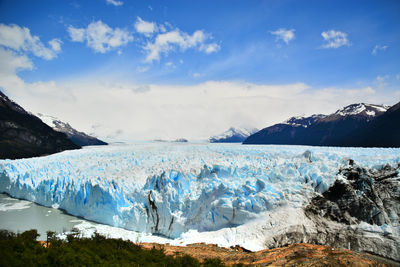 Scenic view of frozen lake against sky