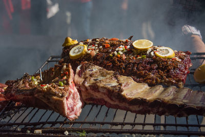 Close-up of meat on barbecue grill