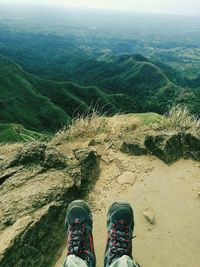 Low section of man against mountain