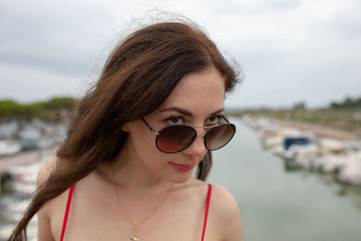 Woman wearing sunglasses looking away