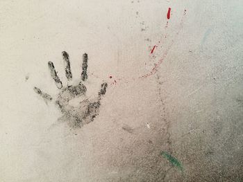 Close-up of handprint on wall