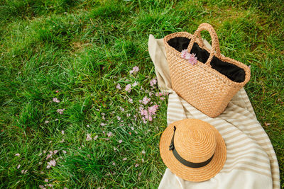 High angle view of hat on grassy field