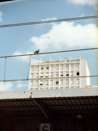 Low angle view of roof against sky