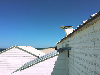Low angle view of built structure against blue sky