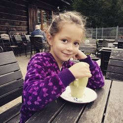 Close-up of girl eating food