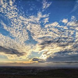 Low angle view of dramatic sky during sunset
