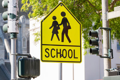 Yellow sign for school zone. school warning sign.