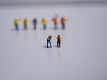High angle view of small people in snow