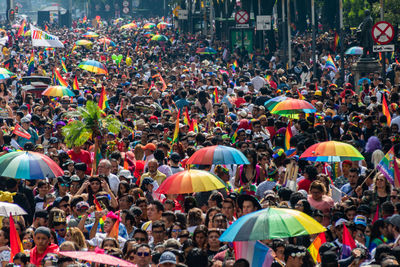 Group of people on street in rain