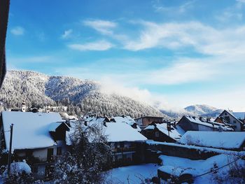 Buildings against sky during winter