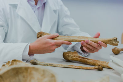 Midsection of man preparing food