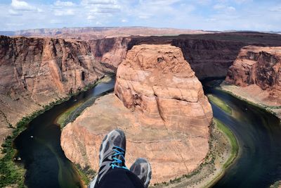 Low section of person at horseshoe bend