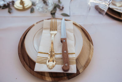 Close-up of wedding rings on table