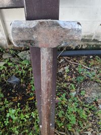 High angle view of rusty metal fence