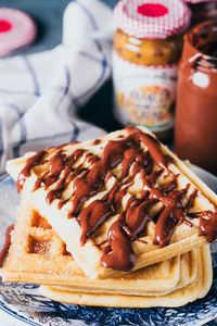 Close-up of chocolate waffles in plate on table