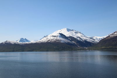 Scenic view of snow covered mountains