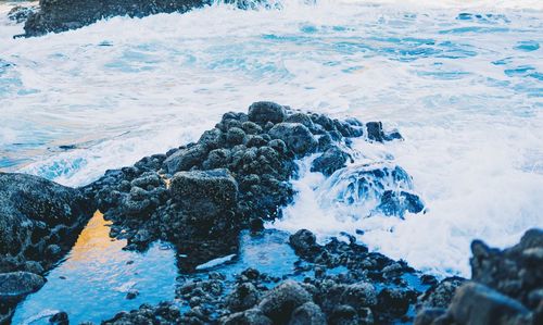 Close-up of rocks in sea