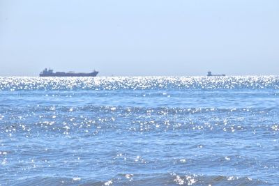 Scenic view of sea against clear sky