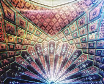 Low angle view of illuminated ceiling