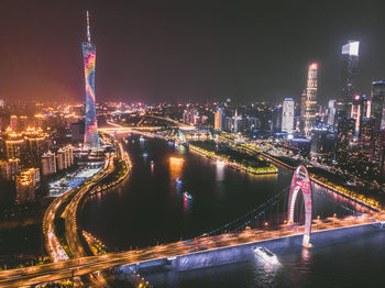 Illuminated buildings in city at night