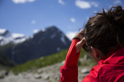 Portrait of woman against mountains