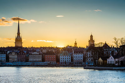 German church in town by riddarfjarden during sunset