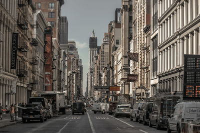 Vehicles on road in city