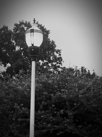 Low angle view of street light against sky