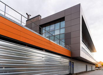 Low angle view of modern building against sky