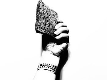 Low section of woman standing against white background