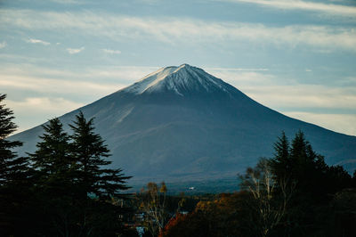 Scenic view of mt fuji against sky during sunrise