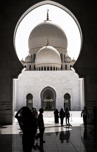 People by mosque