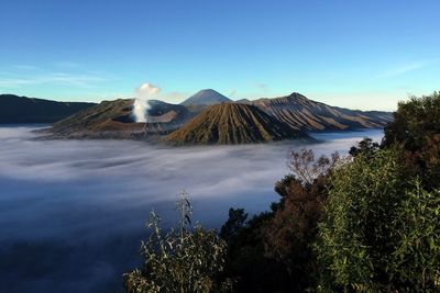 Scenic view of volcanic mountain against sky
