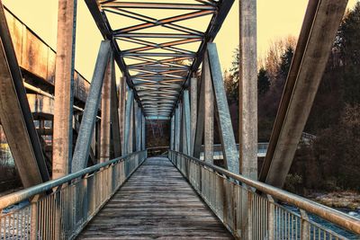 Empty footbridge along footpath