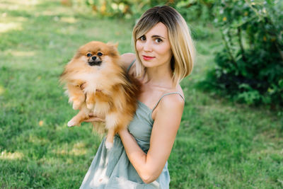 Portrait of woman with dog