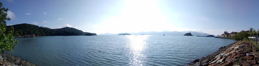 Panoramic view of river against sky