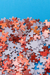 High angle view of toys on blue background