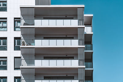 Low angle view of building against clear blue sky