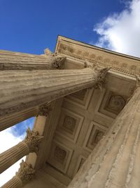 Low angle view of historical building against blue sky