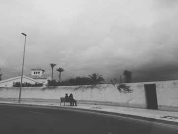 Road against cloudy sky