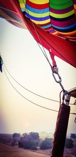 Low angle view of decoration hanging against clear sky