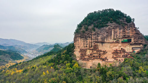 View of a building with mountain in the background